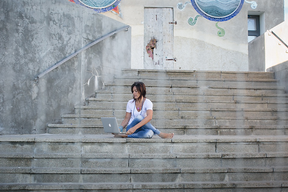 Outdoor Photo Of A Woman On Her Laptop