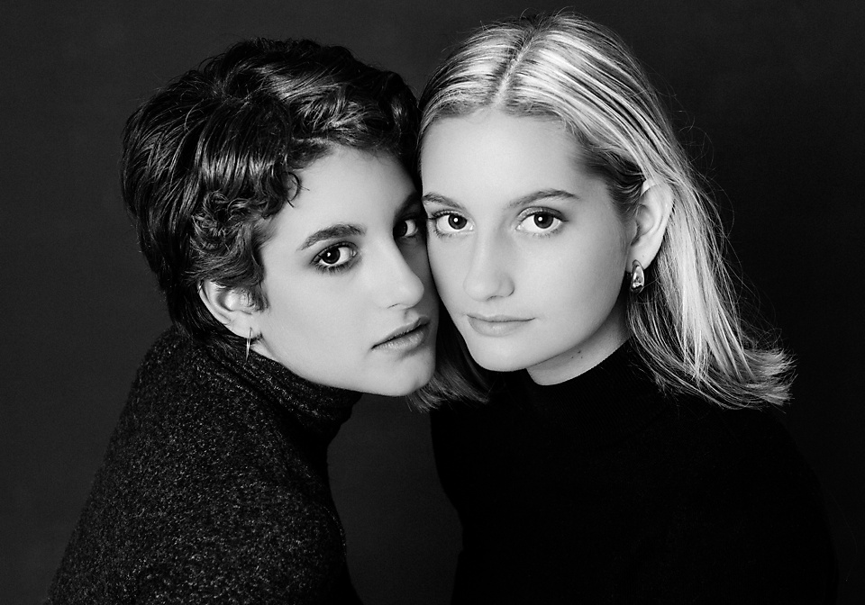 Black And White Studio Portrait Of Siblings